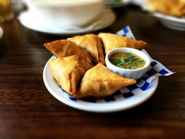 Burmese samosas with dipping sauce